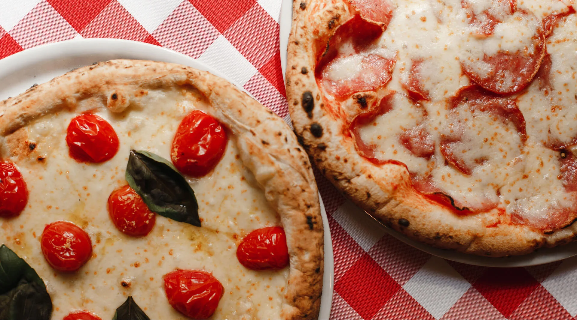 Margherita and salame pizzas, straight from the wood-fired oven
