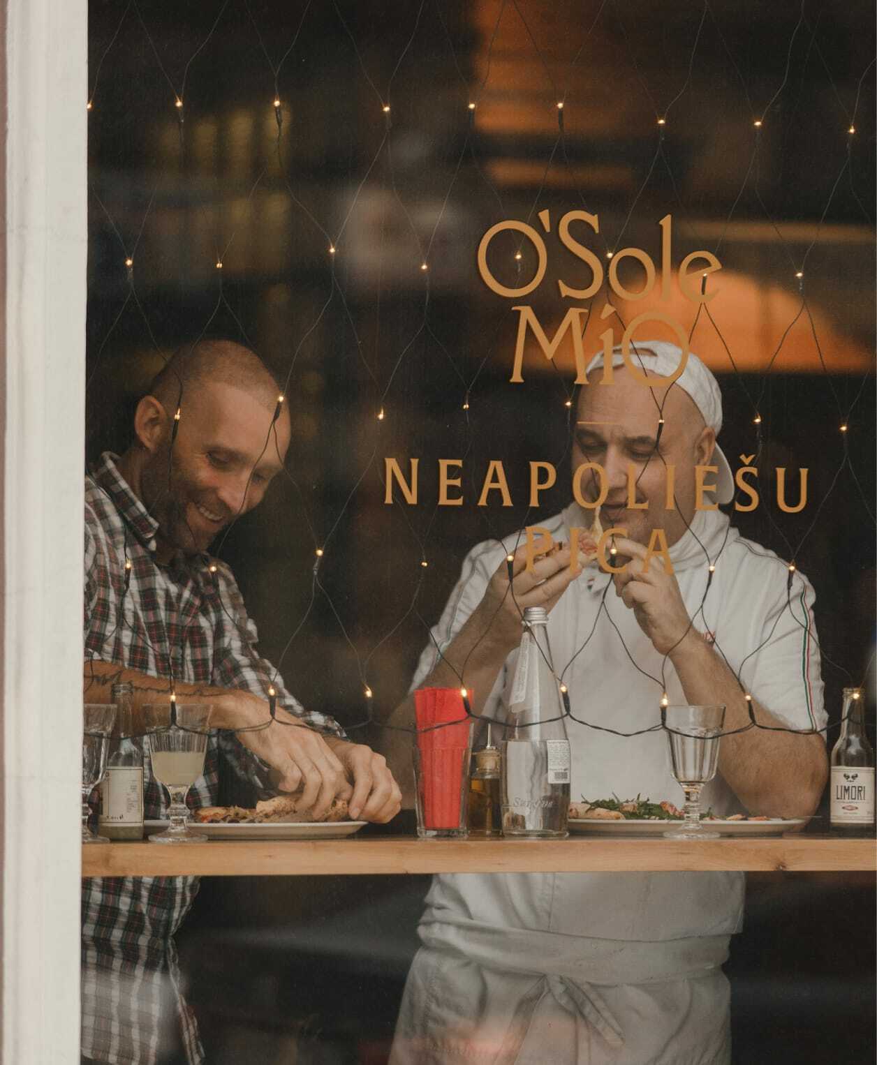 From the storefront window to the pizza box - the same warmth, everywhere