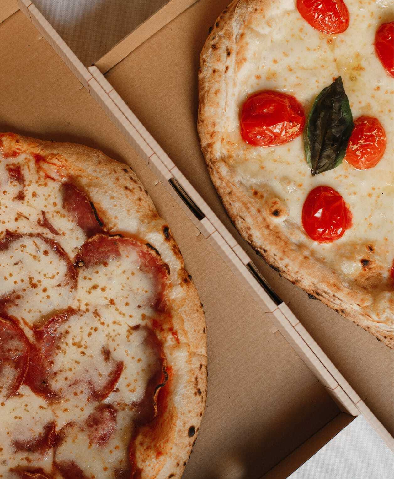 From the storefront window to the pizza box - the same warmth, everywhere